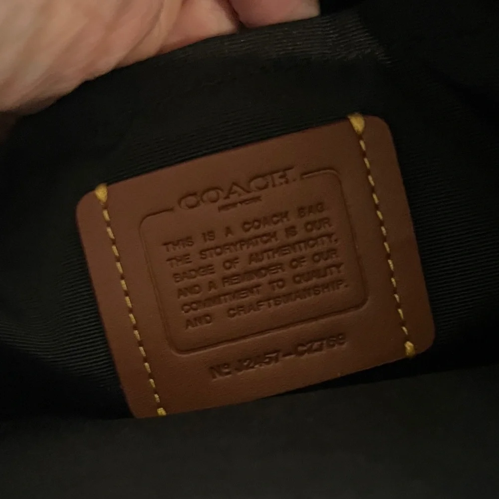Coach Brown Signature Canvas Crossbody with Black Bow Print - Picture 7 of 10